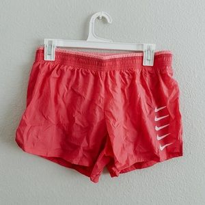 Pink Nike shorts